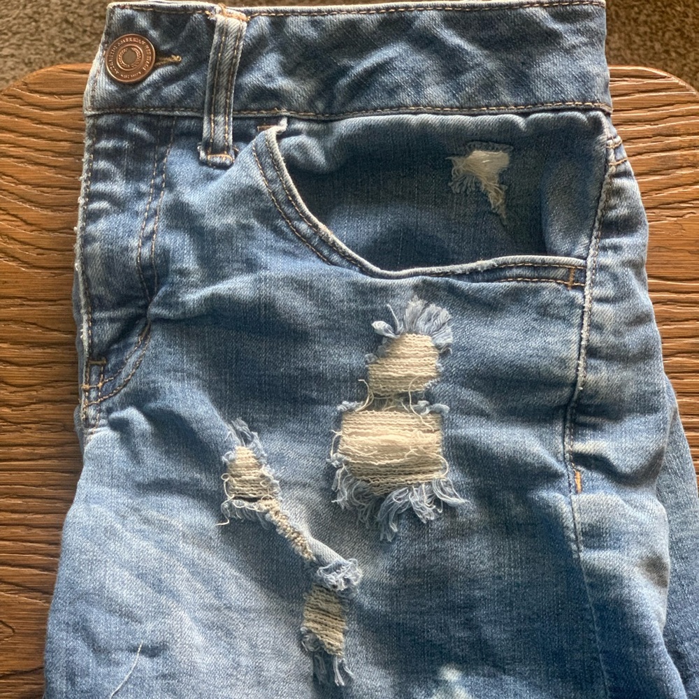 Distressed denim shorts